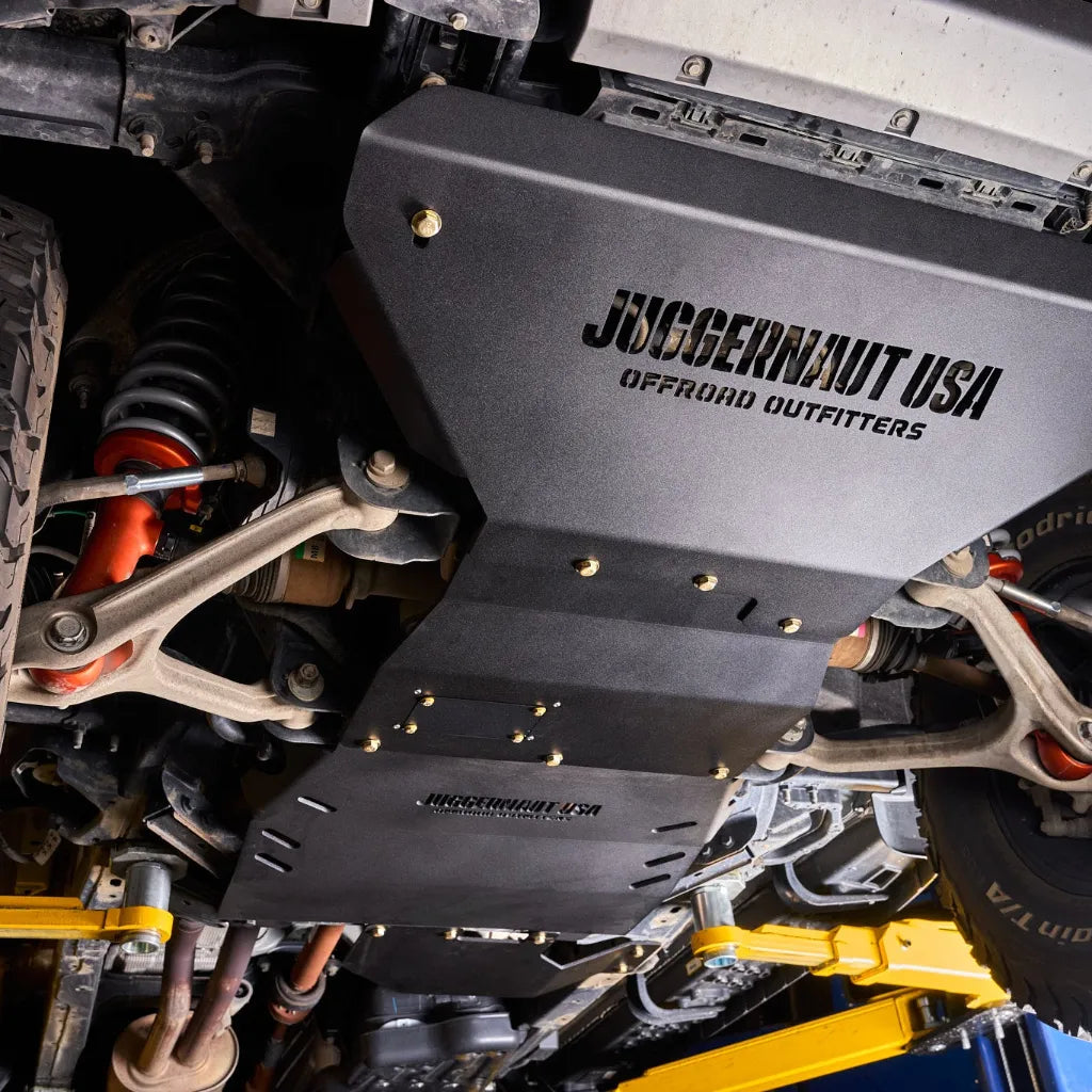 Juggernaut skid plate package installed underneath a Ford Ranger, covering the full underbody run