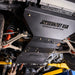 Juggernaut skid plate package installed underneath a Ford Ranger, covering the full underbody run