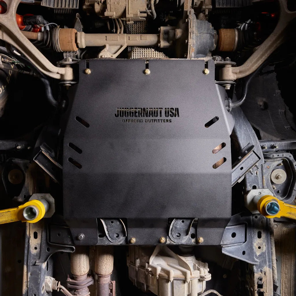 Juggernaut transmission and cat shield skid plate installed underneath a Ford Ranger