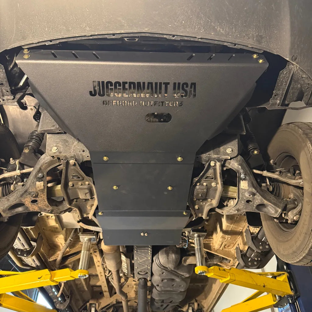 Juggernaut Mercedes Sprinter AWD skid plate package installed underneath the van