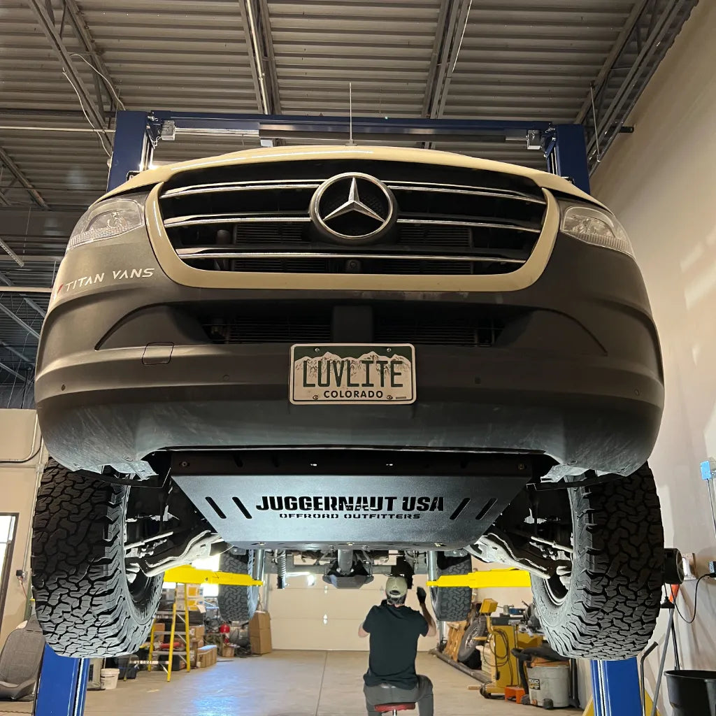 Juggernaut Mercedes Sprinter 4x4 engine and transmission skid plate mounting hardware close-up