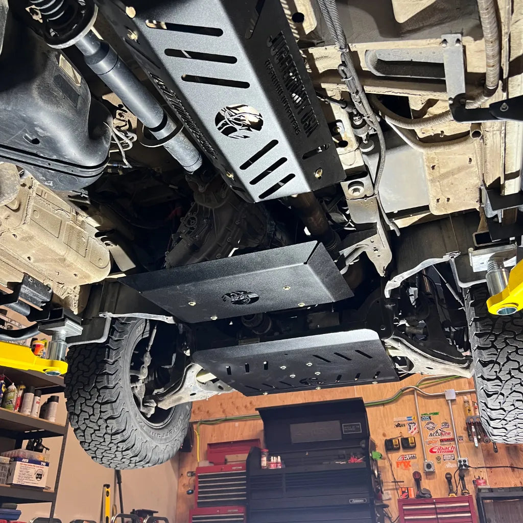 Juggernaut Mercedes Sprinter 4x4 transfer case skid plate mounting hardware close-up