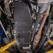 Close-up detail of Juggernaut Super Duty Fuel Tank Skid Plate edge and drain access