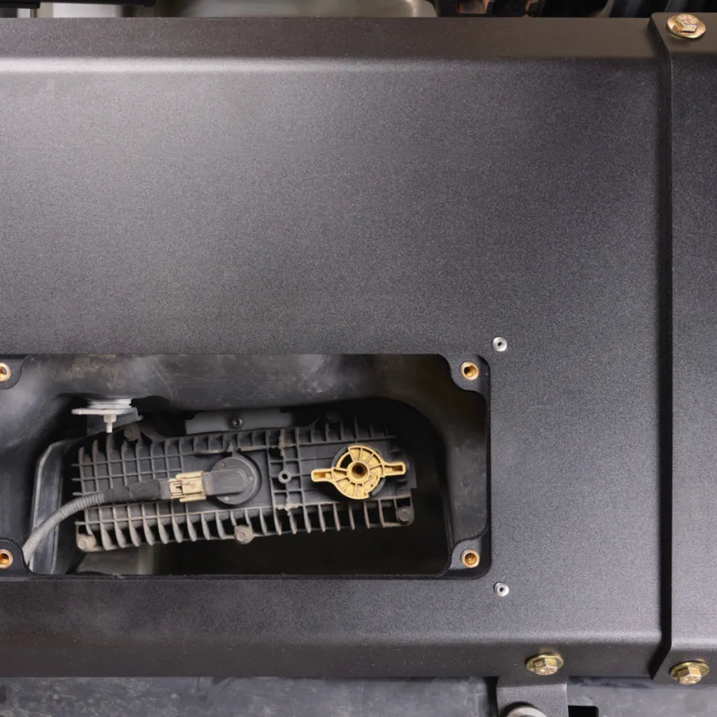 Close-up detail of Juggernaut Super Duty Fuel Tank Skid Plate powder-coated finish