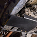 Juggernaut Super Duty Transfer Case Skid Plate installed underbody view, angle one
