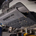 Juggernaut Ford Transit engine skid plate, front product angle showing powder-coated black aluminum