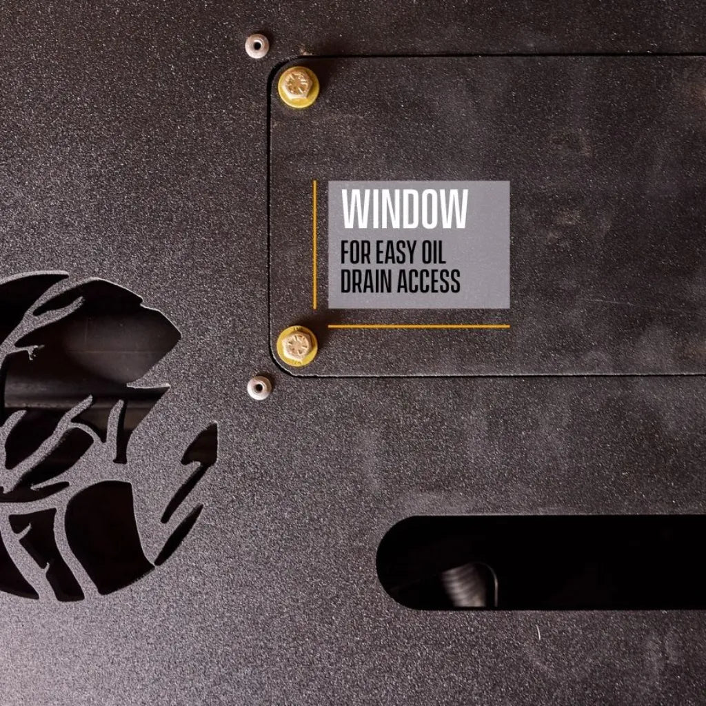 Close-up underbody shot of the Juggernaut engine skid plate bolted to a Ford Transit