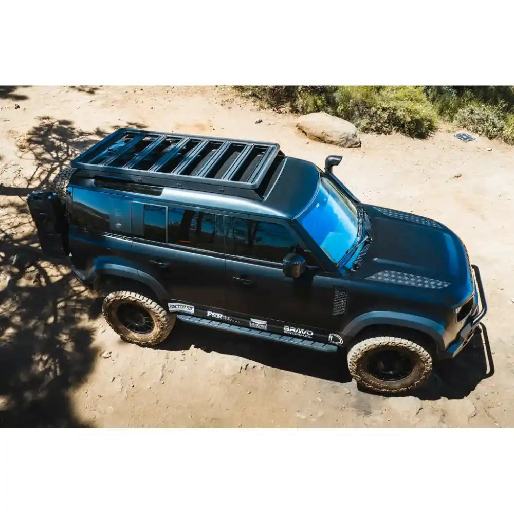 Leitner ACS ROOF platform rack on Land Rover Defender 110, aerial front view