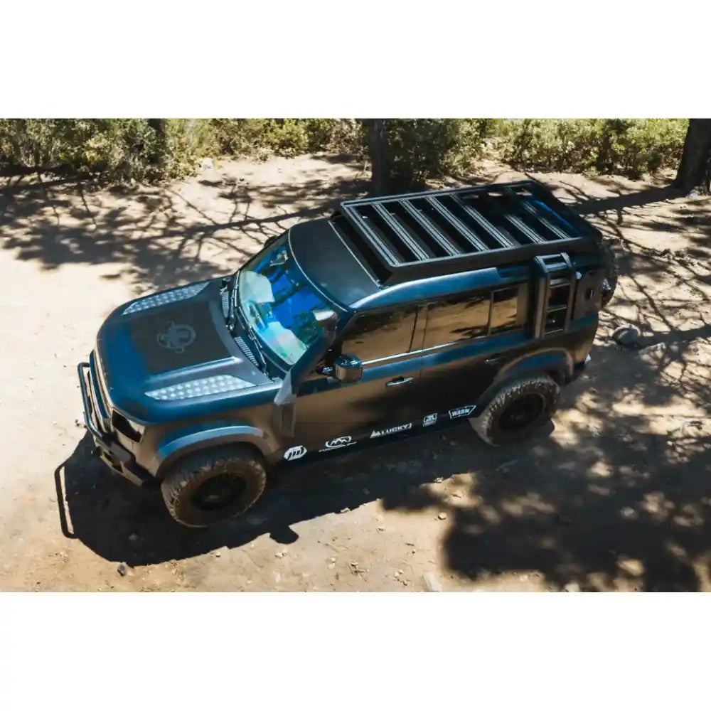 Land Rover Defender 110 with Leitner ACS ROOF platform rack, overhead view on trail