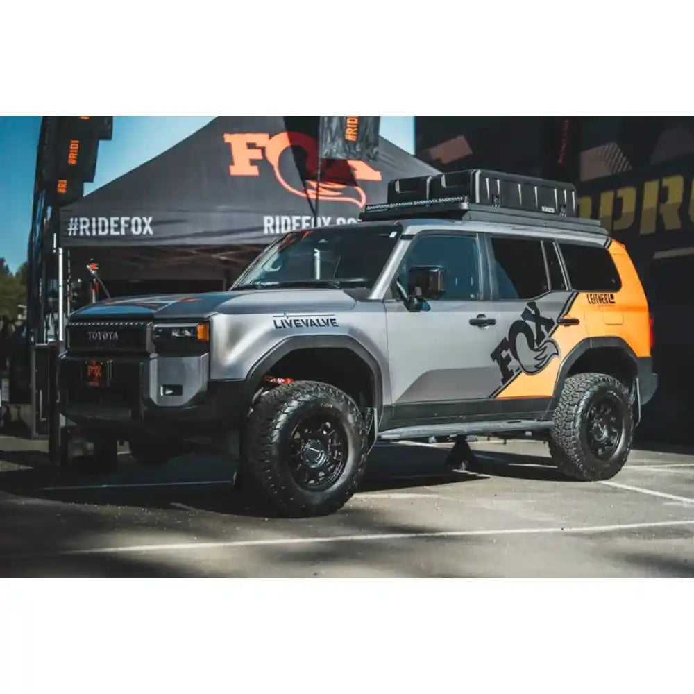 Toyota Land Cruiser LC250 with Leitner ACS ROOF rack and cargo boxes, front three-quarter view