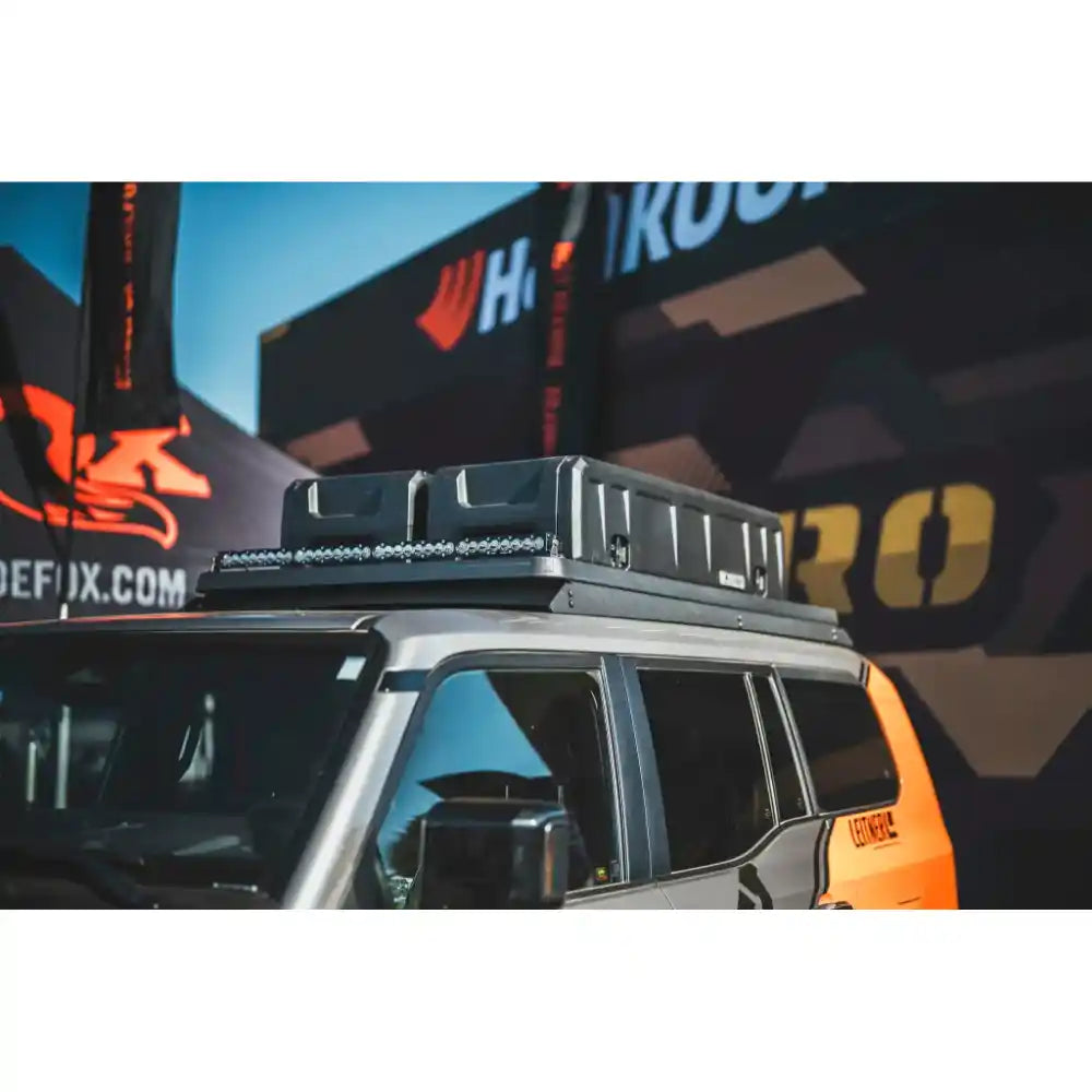 Leitner ACS ROOF rack with cargo case on Toyota Land Cruiser LC250, side view