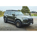 Green Lexus GX550 with Leitner ACS ROOF 3/4 rack, front three-quarter view