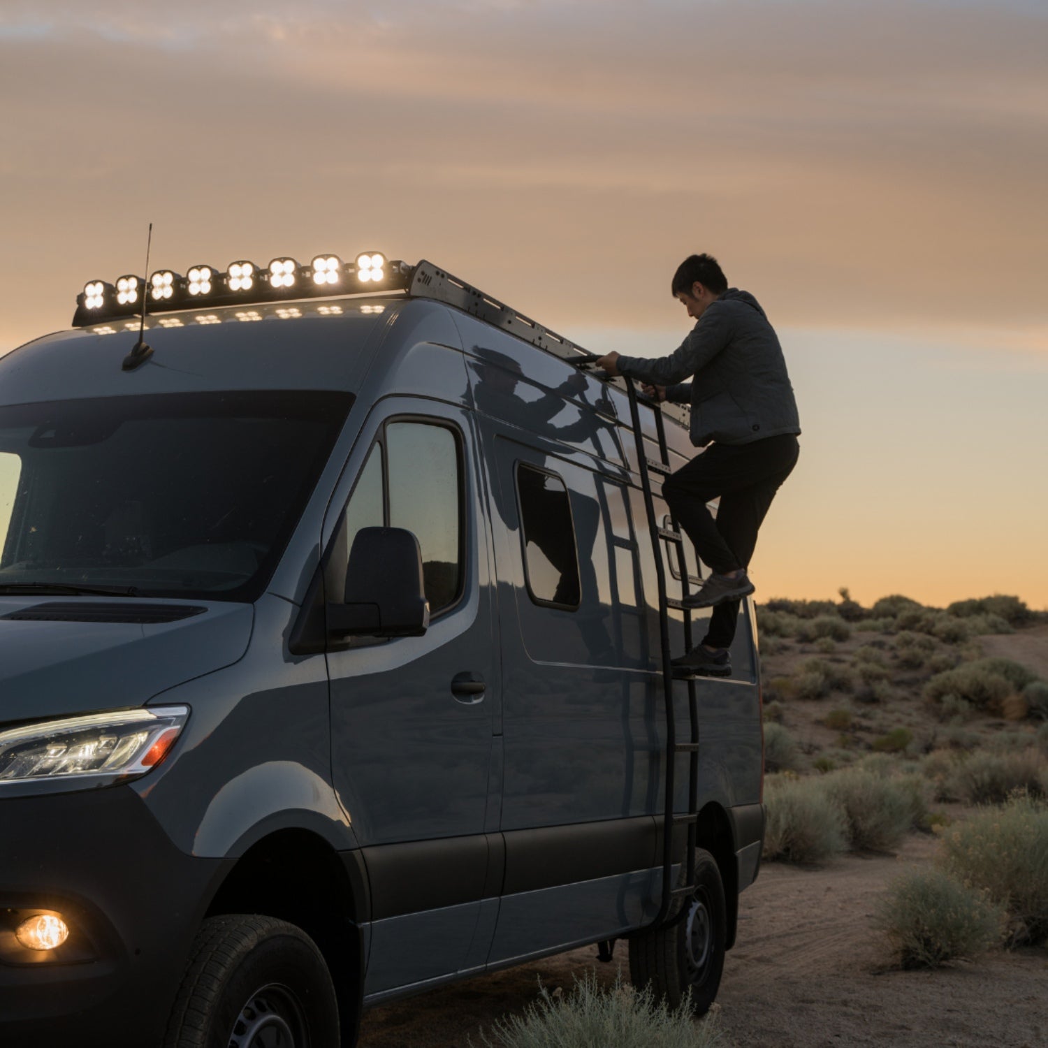 man climbing the ladder to reach cargo