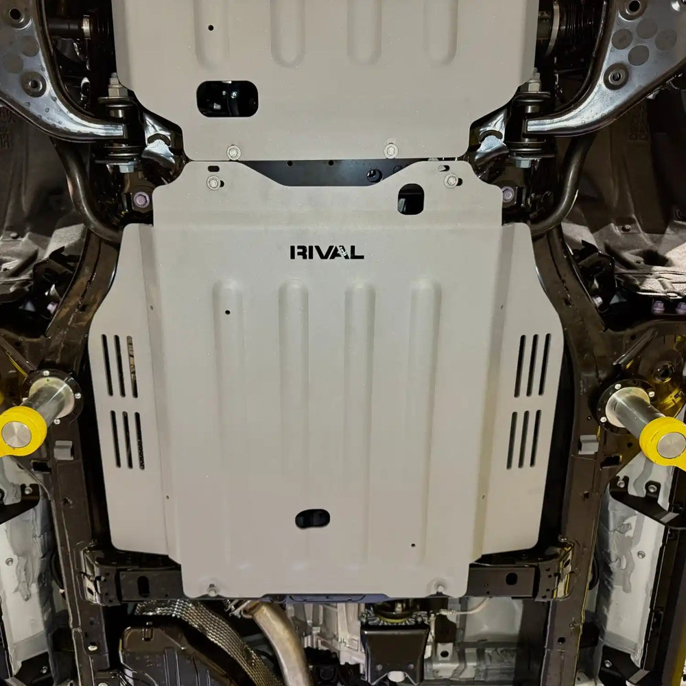 Tacoma underbody view with mounted Rival transmission skid plate