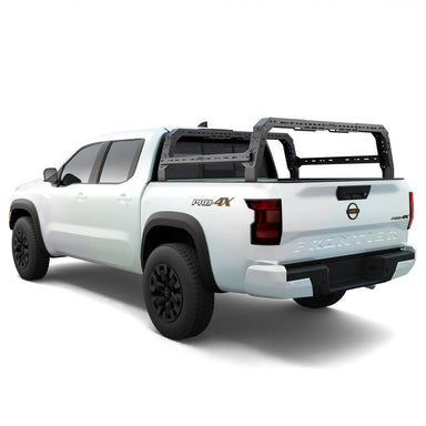 White Nissan Frontier truck with a bed rack on a white background