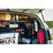 Rago 4Runner Molle storage shelf with gear, hatch open outdoors