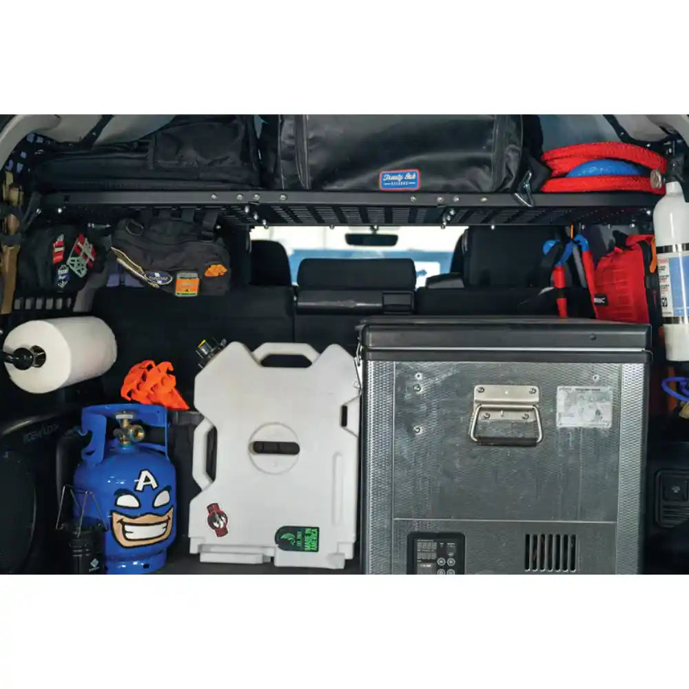 Rago 4Runner Molle storage shelf with water and gear stored