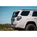 White 5th Gen 4Runner with Rago hatch ladder, rear three-quarter