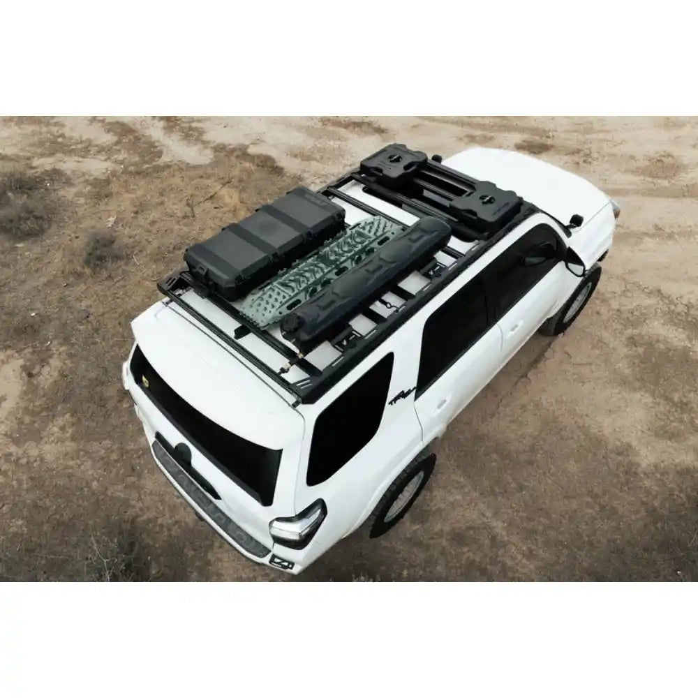Rago roof rack loaded with gear on white 4Runner, aerial rear close