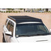 Rago low-profile roof rack on white 4Runner, front angle