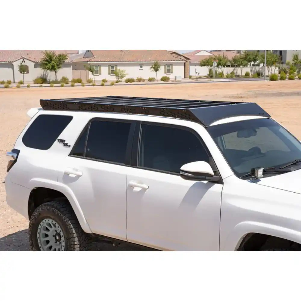 White 2010-2024 Toyota 4Runner with Rago roof rack, front three-quarter