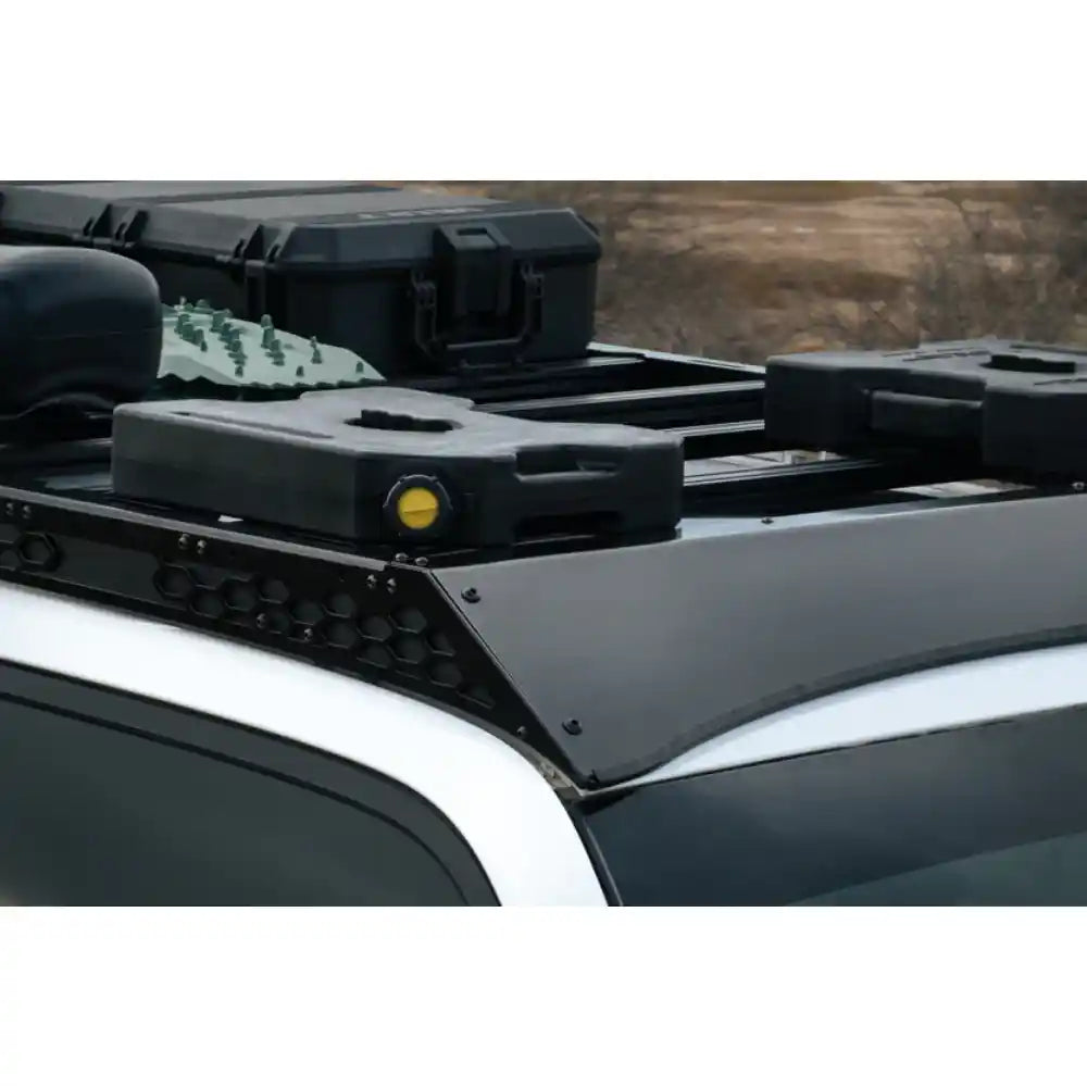 Gear cases mounted on Rago 4Runner roof rack, side close-up