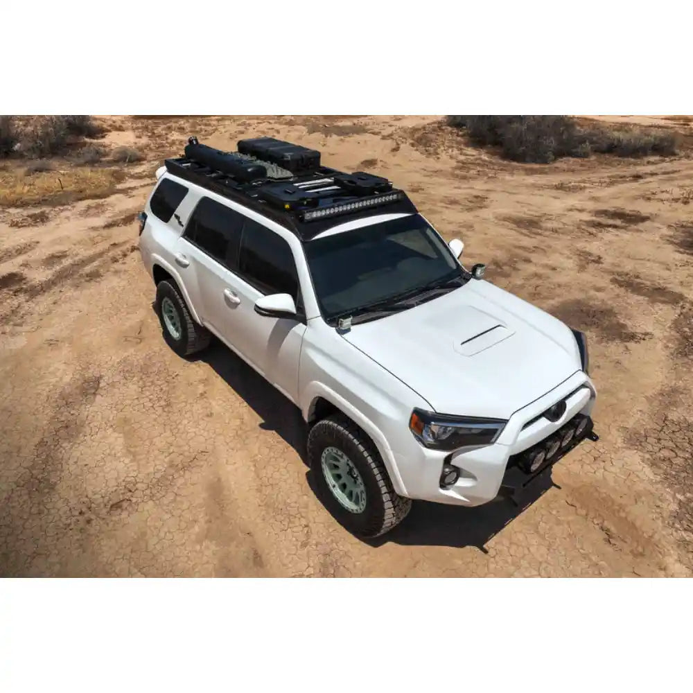 5th Gen 4Runner with loaded Rago roof rack, aerial front three-quarter