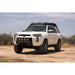 White 5th Gen 4Runner with Rago roof rack and gear in desert, front view