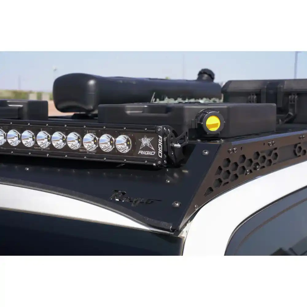 Light bar and gear on Rago 4Runner roof rack, front low angle
