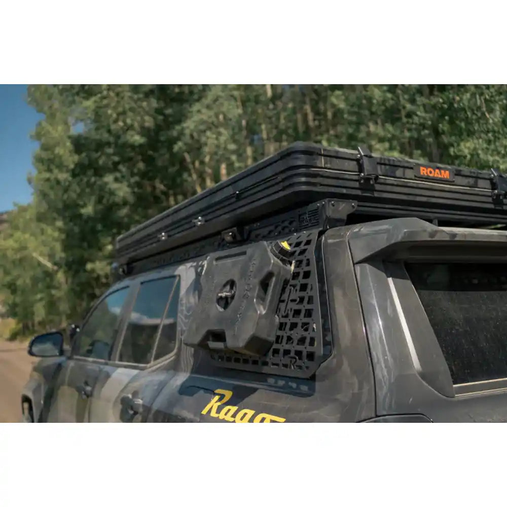 Rago external Molle panel with gear mounted on 4Runner in forest