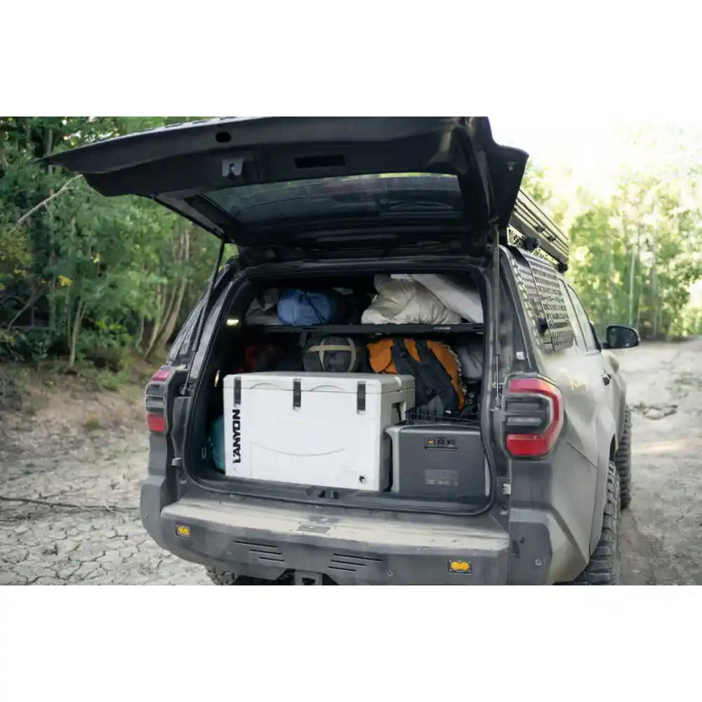 6th Gen 4Runner cargo area with Rago storage shelf, hatch open
