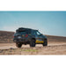 Toyota 4Runner with Rago hatch ladder and roof rack on trail