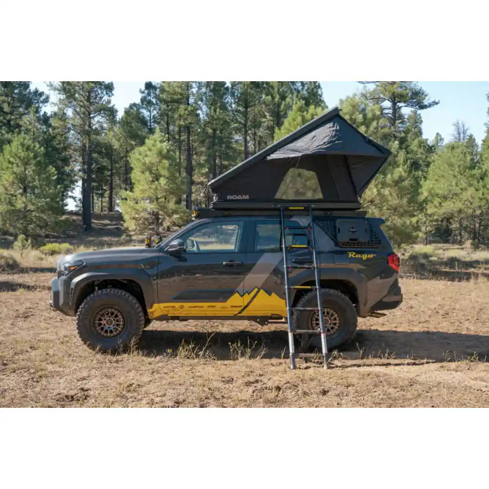Toyota 4Runner camping with rooftop tent and ladder on Rago roof rack