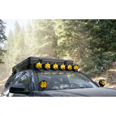 Baja Designs LP6 lights on Rago roof rack light mount, 4Runner front close-up
