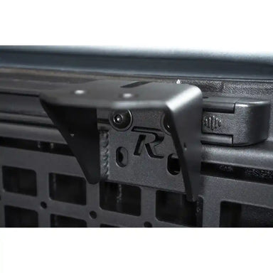 Rago accessory mounting bracket on Toyota bed rail, angle view