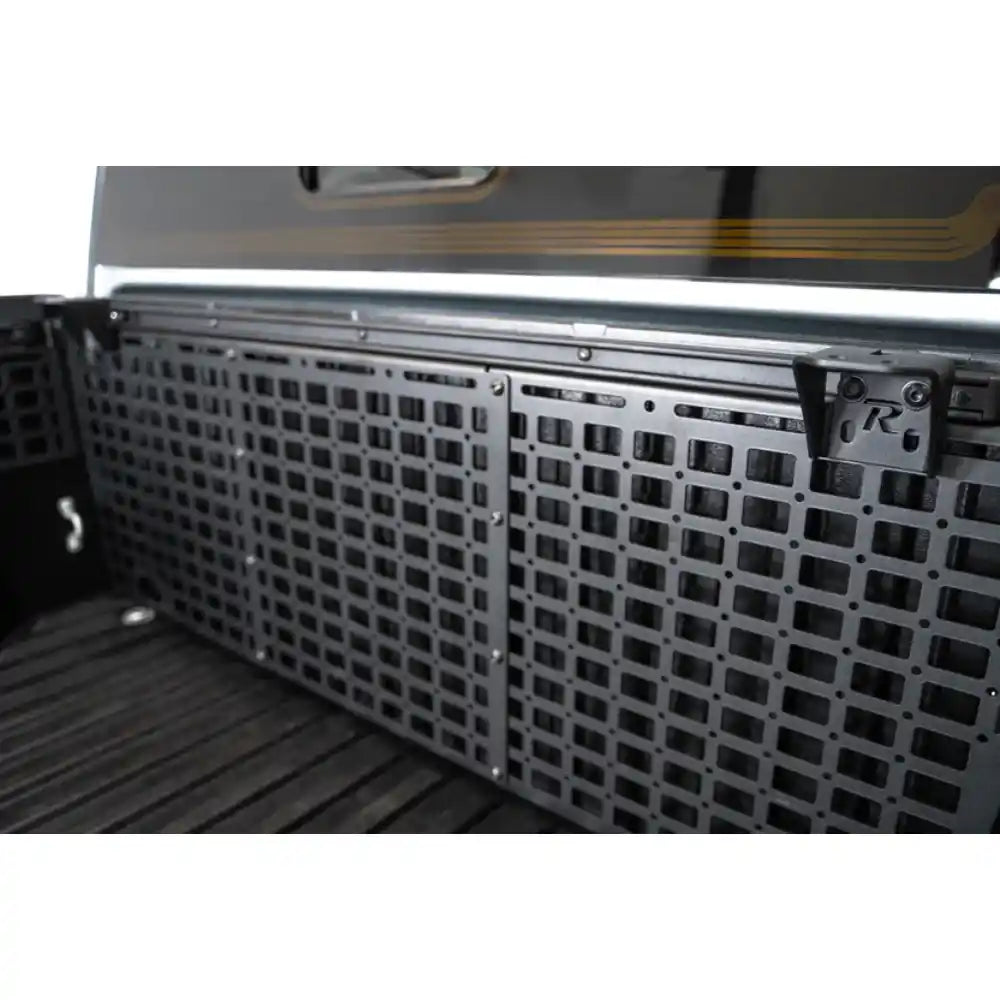 Rago accessory mounting brackets on Toyota bed side rail
