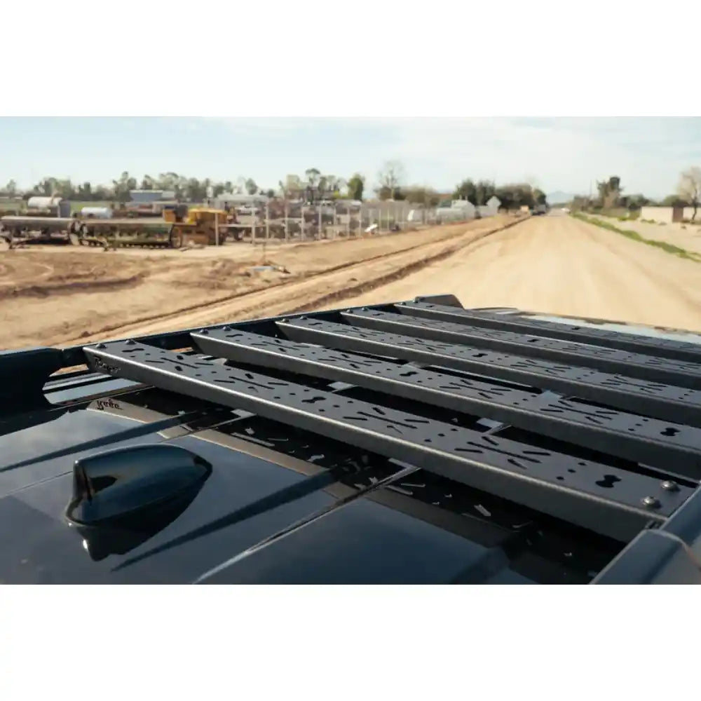 Low-profile Rago crossmembers on factory roof rails
