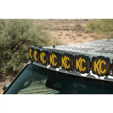 KC HiLites on Rago roof rack light mount, Land Cruiser front