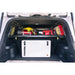Land Cruiser cargo with gear below Rago storage shelf