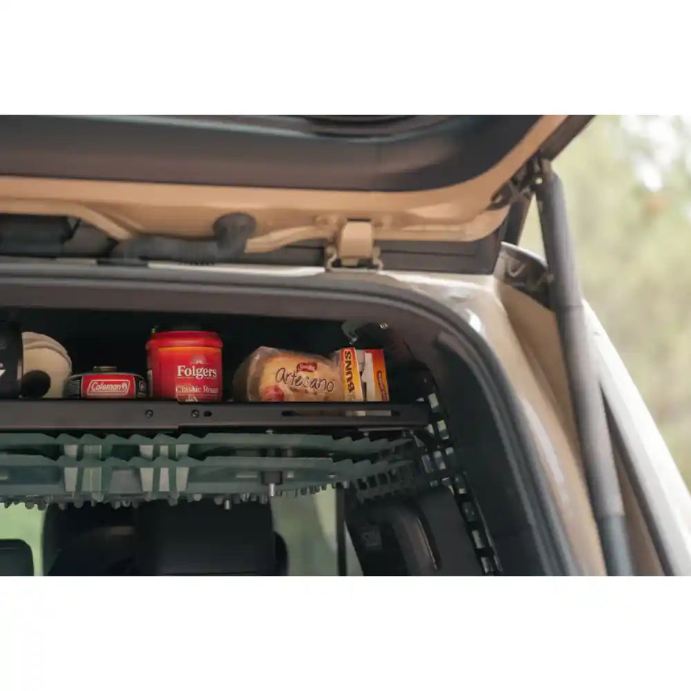 Rago storage shelf with gear in Lexus GX 550
