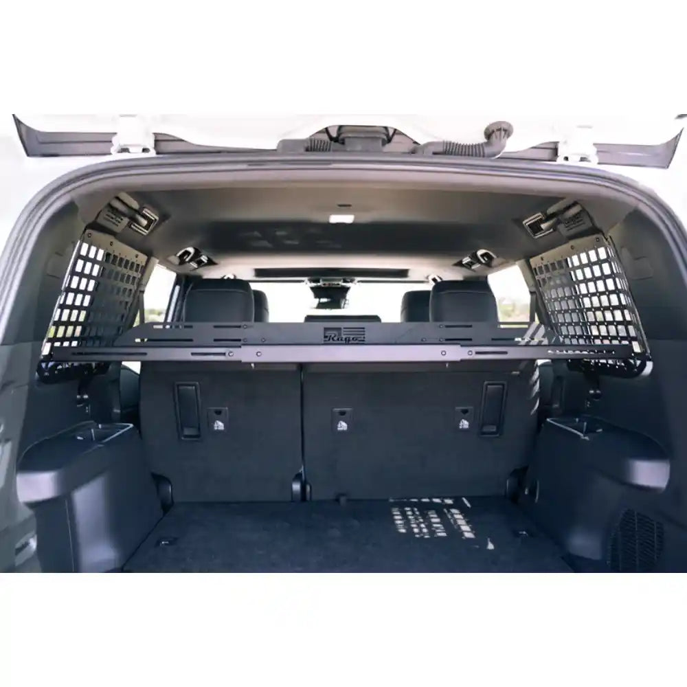 Land Cruiser cargo area with Rago shelf installed, rear view