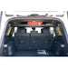 Land Cruiser cargo area with Rago storage shelf, rear view