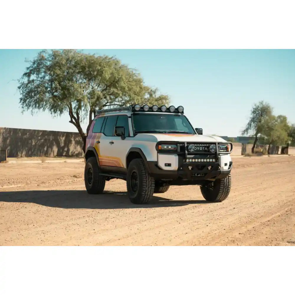 2024 Land Cruiser with Rago RIGID light mount in desert, front view