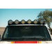 RIGID round lights on Rago Land Cruiser roof rack, front low angle