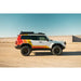 2024 Land Cruiser with Rago light pocket roof rack in desert, side view