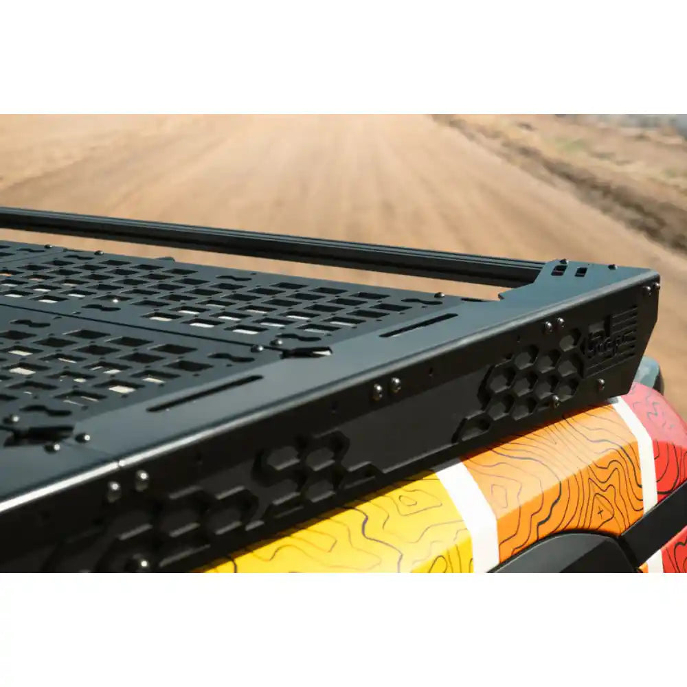 Rago roof rack on Land Cruiser with orange livery, top angle