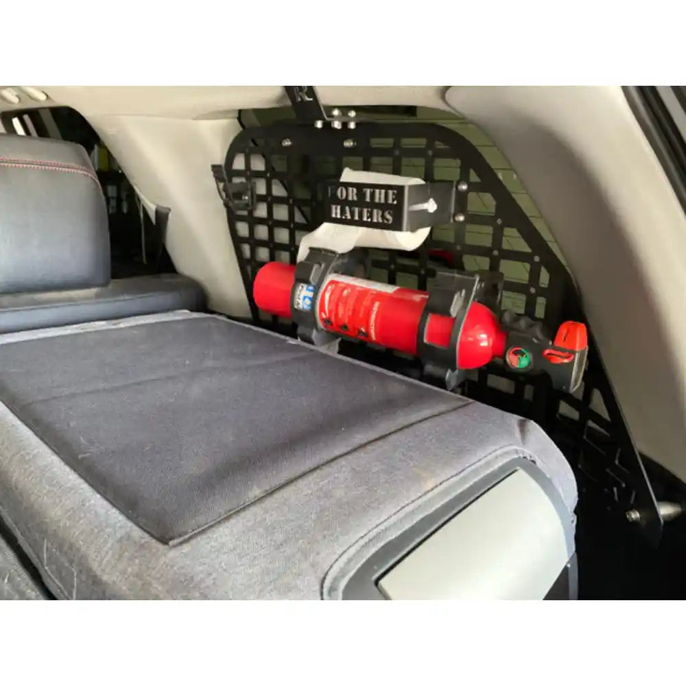 Rago toilet paper holder mounted on Molle panel