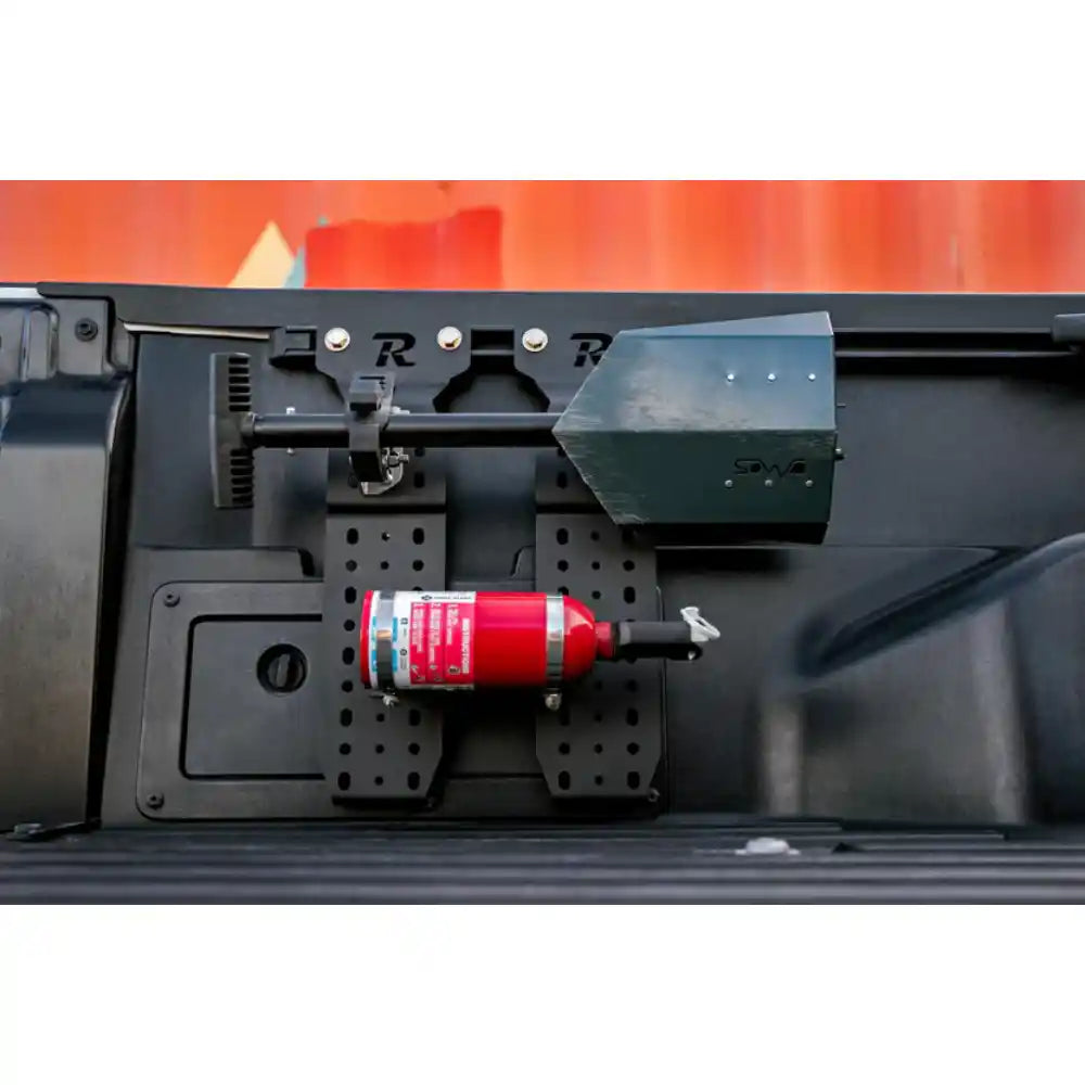 Rago Quick Fist mount holding fire extinguisher