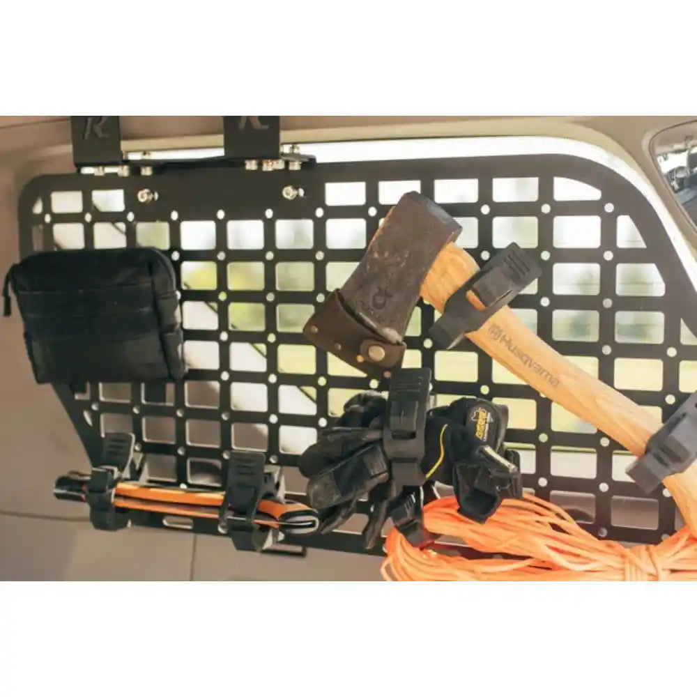 Rago Quick Fist mounts holding gear on Molle panel