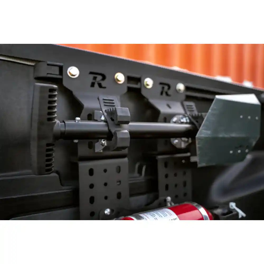 Rago Quick Fist mount holding tool on Molle panel